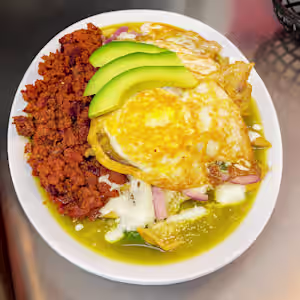 La Fondita signature dishes Chilaquiles with Meat & EggsBurritoNachosTostadas